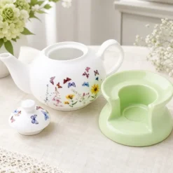 Dzbanek porcelanowy z zielonym podgrzewaczem biały imbryk w motyle do zaparzania herbaty 1L ODELO VEDIA OD2961 Delhan